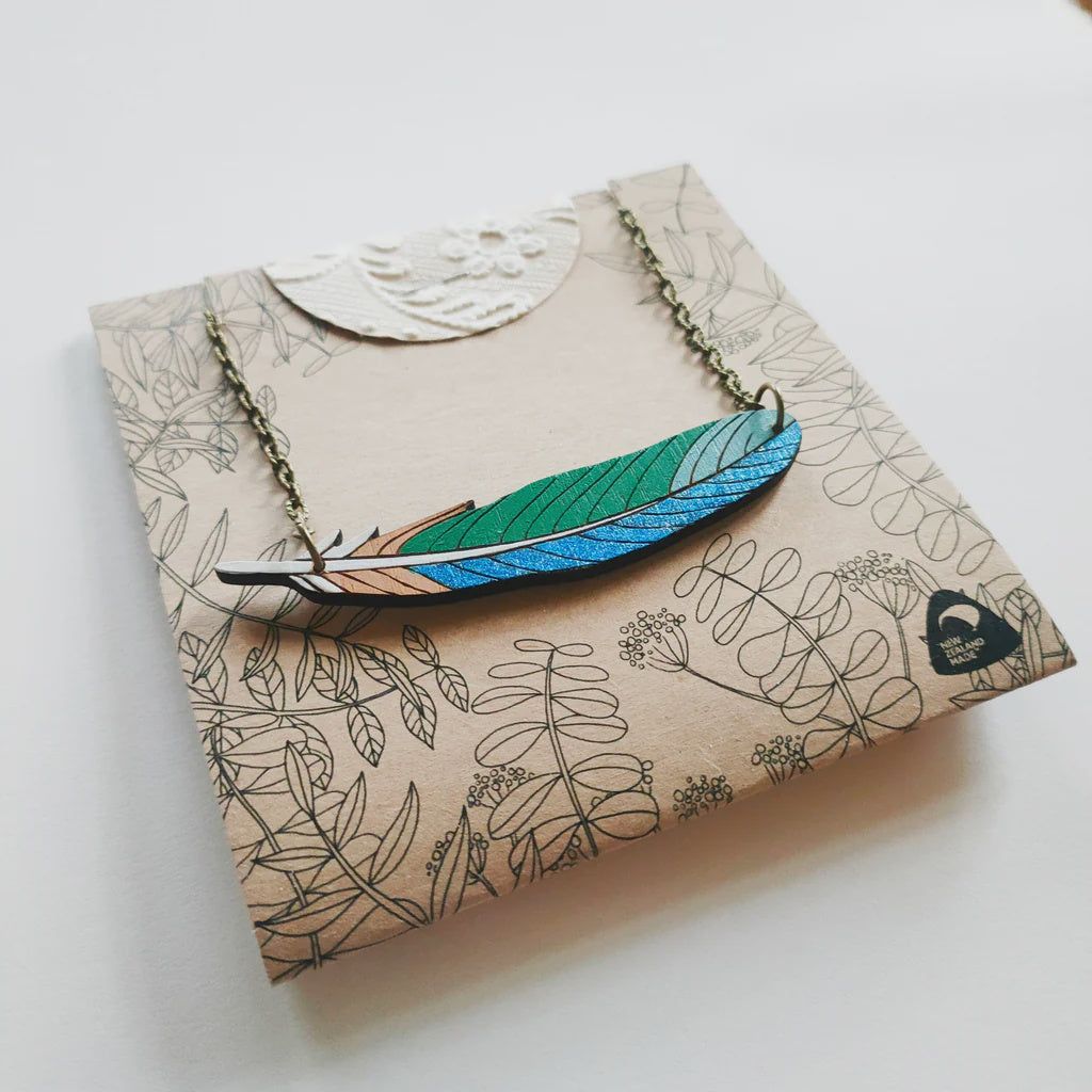 Tui feather necklace