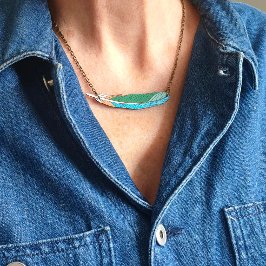Tui feather necklace