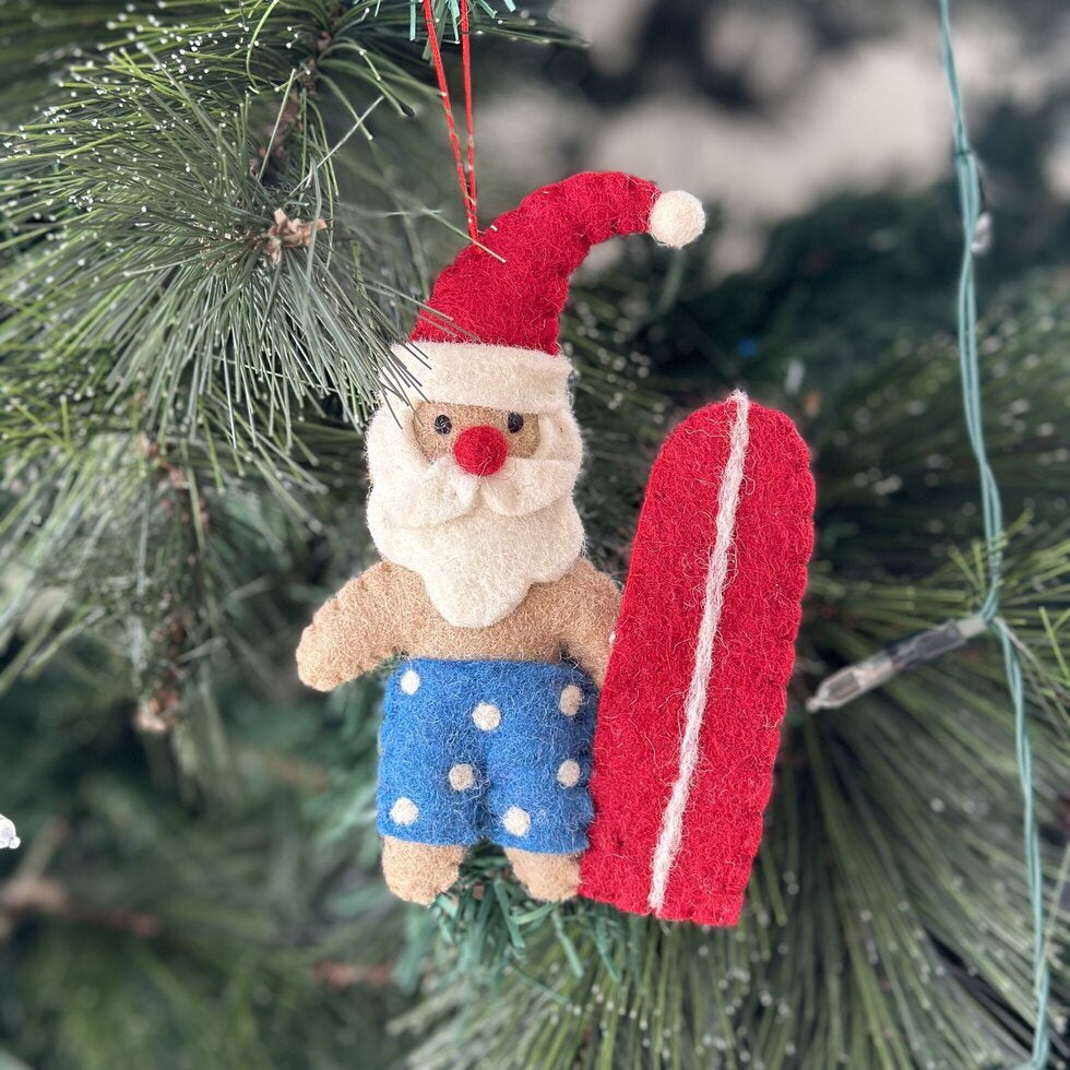 Surfing santa w blue shorts