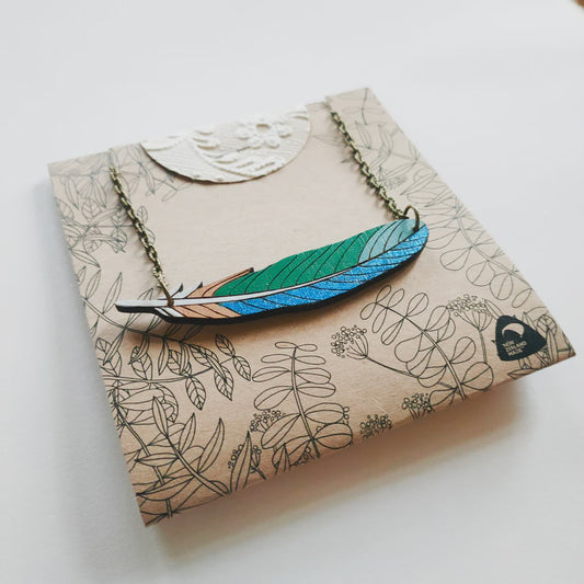 Tui feather necklace