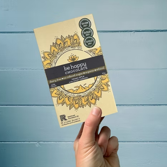Be Happy | award winning vegan m*lk chocolate with gooey caramel