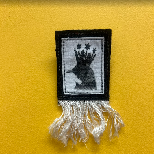 The black Pixie | Fringed Tui Brooch