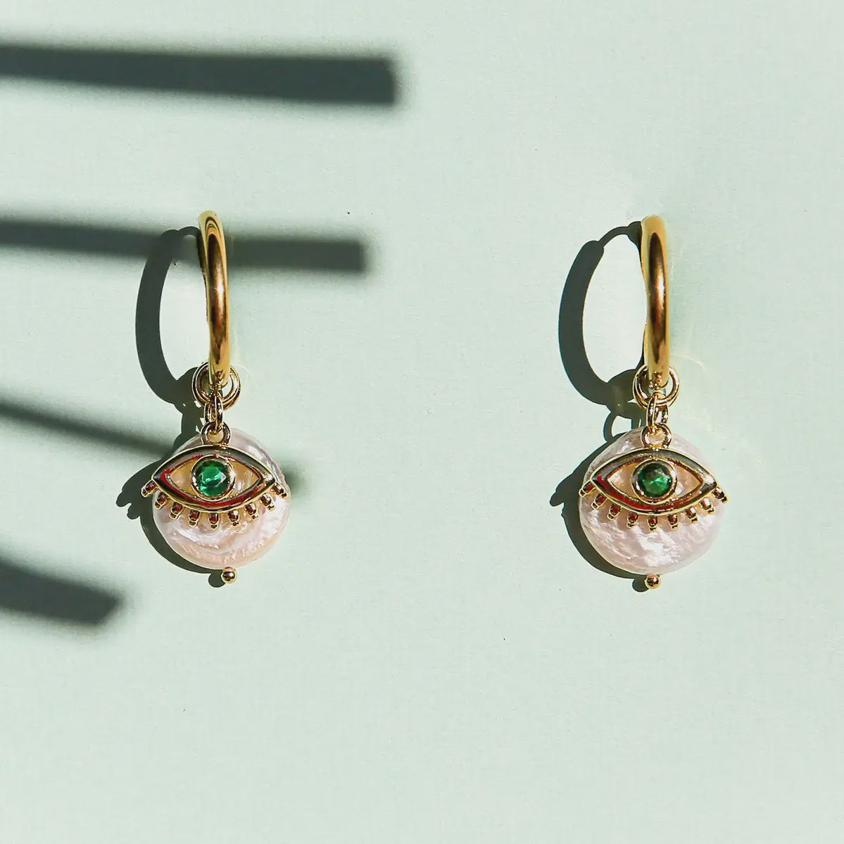 Kingston Jewellery | Green Eye Huggie Hoops